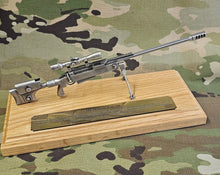Load image into Gallery viewer, Pewter TAC50 Sniper Rifle on solid light oak wooden plinth. Presentation